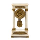 A French Marble and Gilt Metal Portico Clock Height 17 1/2 inches.