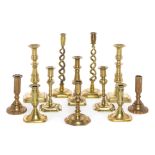 A Collection of Victorian Brass Candlesticks Height of tallest 11 3/4 inches.