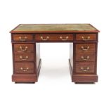 A George III Style Mahogany Pedestal Desk Height 30 x width 48 x depth 26 1/4 inches.