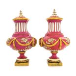 A Pair of Sevres Style Covered Porcelain Urns Height 17 inches.