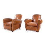 A Pair of Leather Upholstered Club Chairs Height 35 3/4 inches.