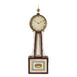 A Federal Mahogany Banjo Clock Height 34 1/8 inches.