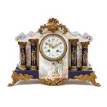 A French Gilt Metal Mounted Porcelain Mantel Clock Width 15 1/2 inches.