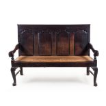 A George III Oak Settle Height 41 3/4 x width 59 x depth 27 inches.