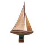 A Painted Model of a Sailboat Height 23 1/2 width 13 1/2 inches.