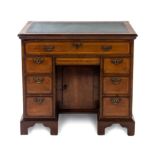 A George II Walnut Kneehole Desk