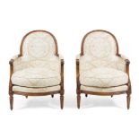 A Pair of Louis XVI Style Oak Bergeres Height 36 1/2 inches.