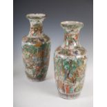 A pair of Chinese porcelain crackle glazed vases, Qing Dynasty, decorated with green, blue and