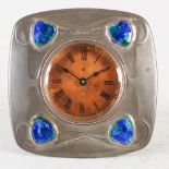 A Liberty & Co. pewter and enamel square easel clock designed by Archibald Knox, the circular dial