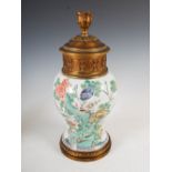 A Chinese porcelain ormolu mounted famille verte jar, Qing Dynasty, converted to a table lamp,