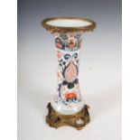 A 19th century Japanese ormolu mounted Imari vase, decorated with flowers and foliage, enclosed by