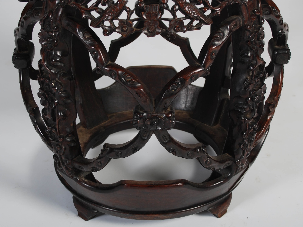 A Chinese dark wood barrel shaped jardiniere stand, Qing Dynasty, the circular top with a mottled - Image 4 of 5