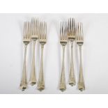 A composite set of six George III silver table forks, three London, 1780, makers mark possibly