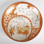 A late 19th/early 20th century Japanese Kutani charger, decorated with a circular panel of figures