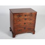 A 19th century mahogany bachelors chest, the rectangular top with a moulded edge above a brush slide