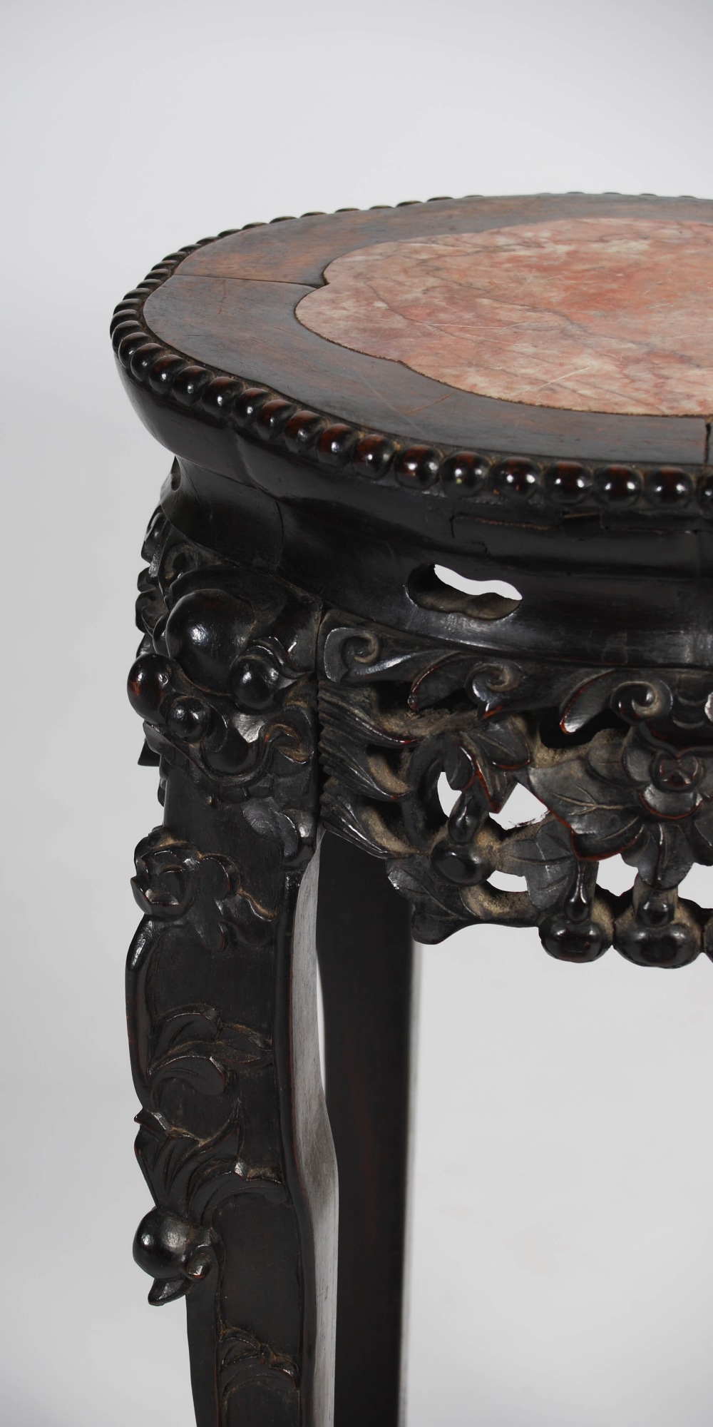 A Chinese dark wood jardiniere stand, late Qing Dynasty, the shaped octagonal top with a mottled red - Image 4 of 5