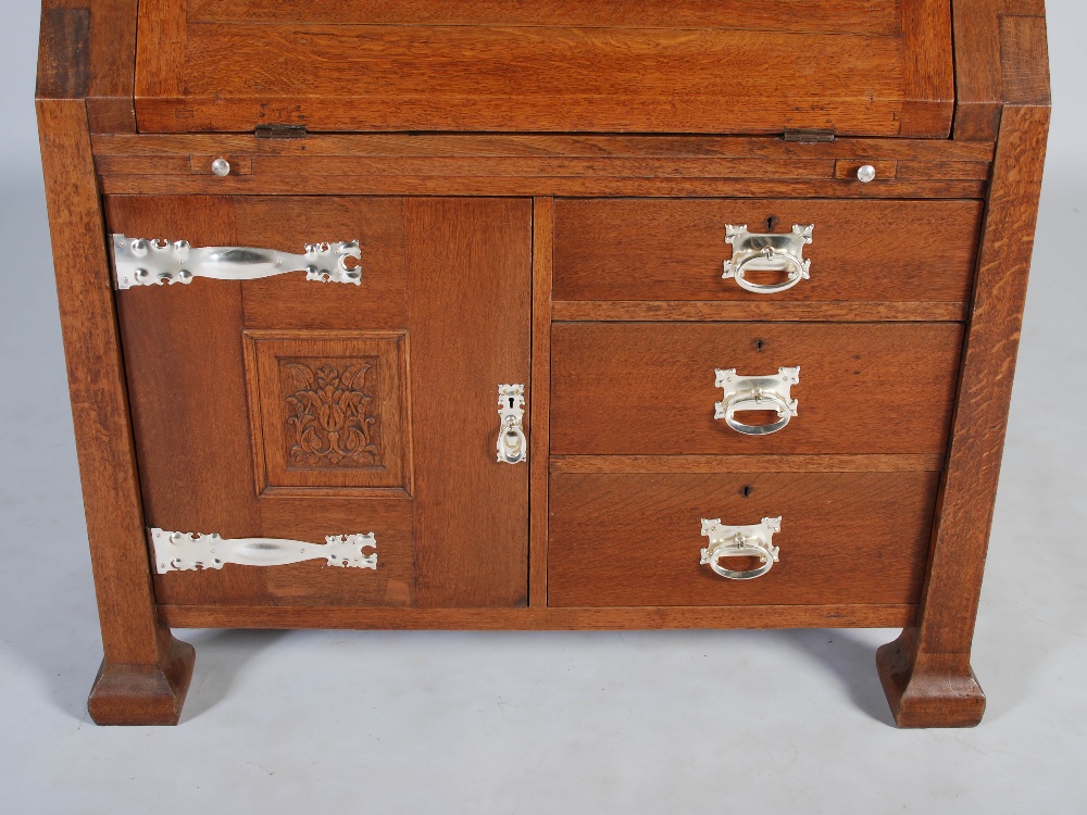 An oak Arts & Crafts style bureau bookcase, the moulded cornice above a plain frieze centred with - Image 5 of 7