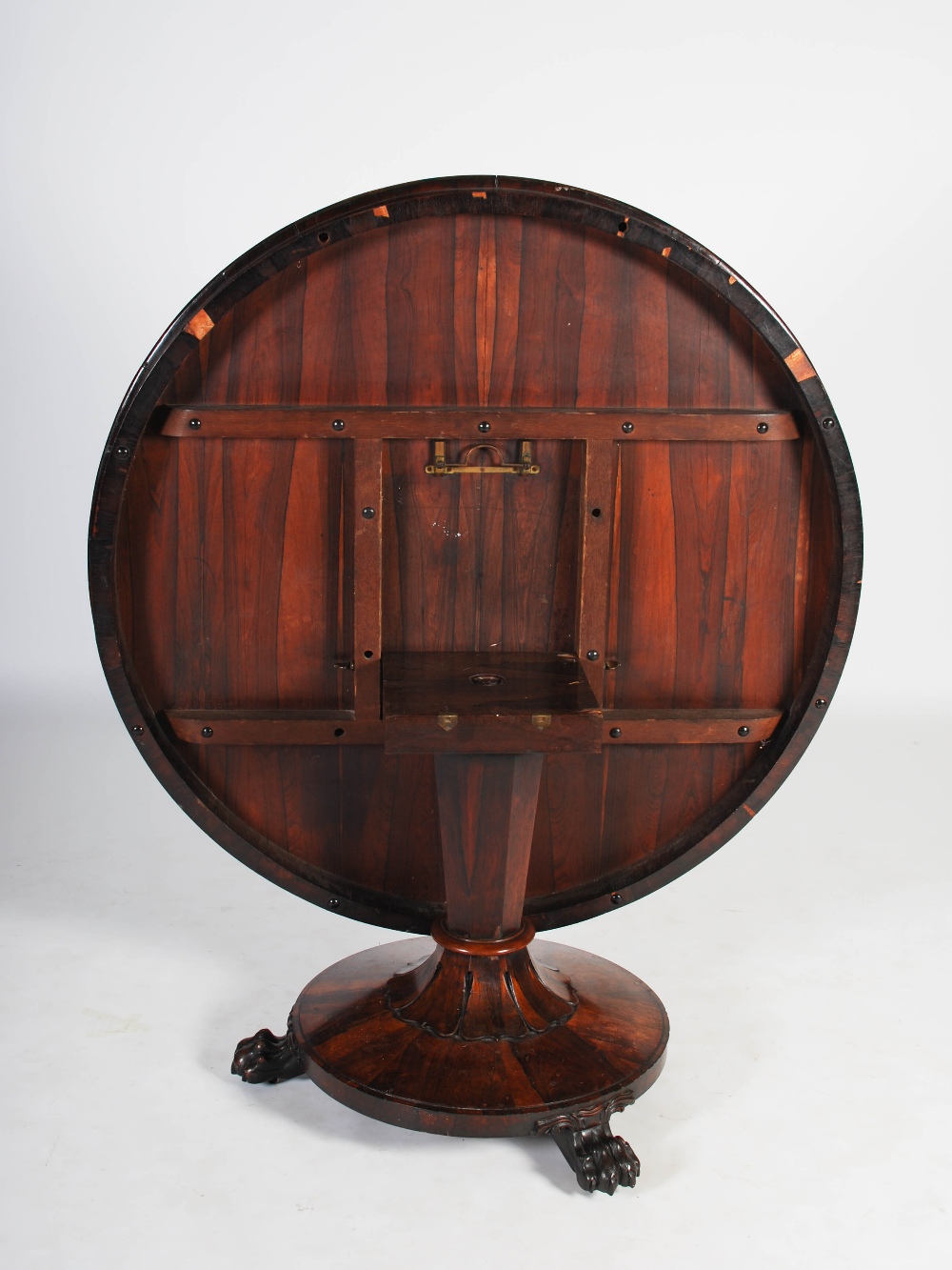 A 19th century rosewood snap top dining table, the hinged circular top raised on a tapered octagonal - Image 2 of 6