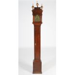 An 18th century lantern clock in an oak longcase, John Dison, St. Ives, the 5" brass dial with a