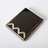 An Art Deco silver and black enamel card case, import marks for London, 1931, Mappin & Webb, the