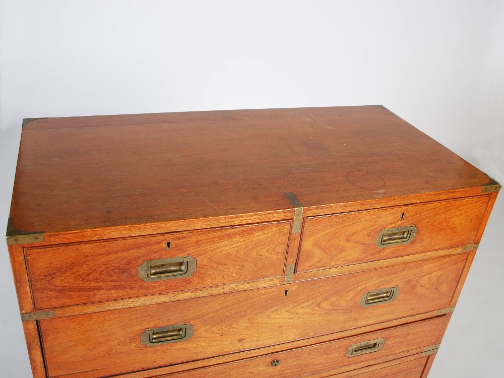 A 19th century teak and brass bound two part secretaire chest, the upper section with two short - Image 2 of 7