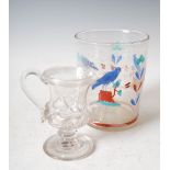 A 19th century glass cream jug, engraved with initials MR entwined within rose bud and thistle