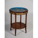 A late 19th century walnut, porcelain and gilt metal mounted occasional table, the circular top