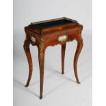 A Victorian kingwood and ormolu mounted jardiniere stand, the rectangular top with a pierced gallery