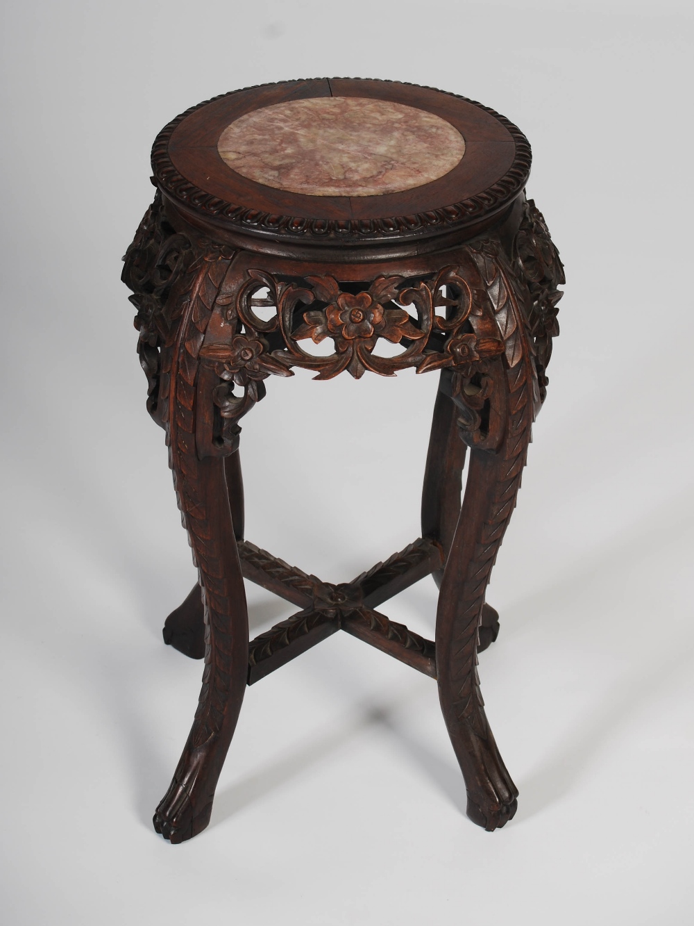 A Chinese dark wood jardiniere stand, late Qing Dynasty, the circular top with a mottled red - Image 2 of 3