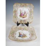 A pair of Dresden porcelain reticulated square shaped cabinet plates, decorated with court couples