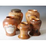 Five 19th century stoneware tobacco jars, to include a pair of jars and one brass cover inscribed "