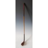 A late 19th century hickory shafted long nose scared neck putter by Tom Morris, stamped 'T. MORRIS',