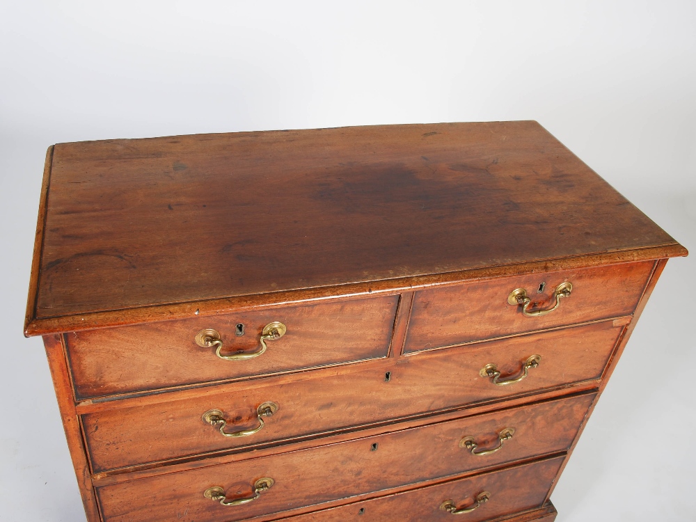 A George III mahogany chest, the rectangular top with a moulded edge, above two short and three long - Image 2 of 4