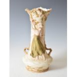 A Royal Dux Art Nouveau pottery twin handled vase, modelled with a maiden and foliage, applied