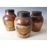 Three 19th century stoneware tobacco jars, one with hand painted vignette 'ST. VINCENTS', above