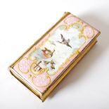 An 18th century English enamel and gilt metal pink ground Etui in the form of a book, probably