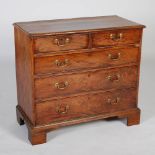 A George III mahogany chest, the rectangular top with a moulded edge, above two short and three long