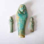 An Ancient Egyptian turquoise glazed Ushabti figure, 11.5cm long, together with two other smaller