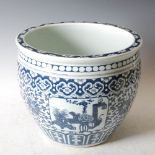 A Chinese porcelain blue and white jardiniere, decorated with four shaped panels enclosing