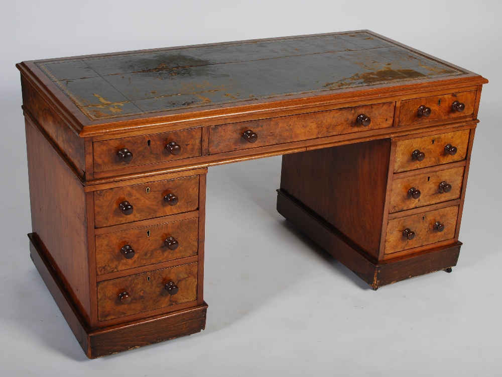 A Victorian walnut Country House pedestal desk, the rectangular top with green and gilt tooled