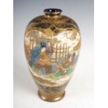 A Japanese Satsuma pottery blue ground vase, Meiji period, decorated in shallow relief with panels