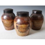 Three 19th century stoneware tobacco jars and covers, one with hand painted vignette inscribed '