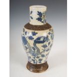A Chinese porcelain blue and white crackle glazed jar, Qing Dynasty, decorated with pair of dragons,