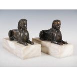 A pair of late 19th century French bronze Sphinx in the Egyptianesque taste, mounted on