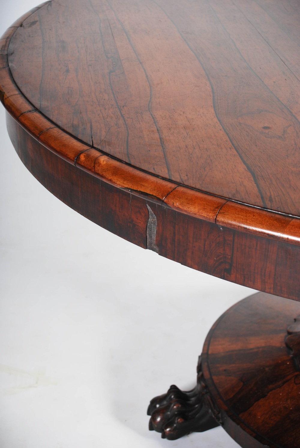 A 19th century rosewood snap top dining table, the hinged circular top raised on a tapered octagonal - Image 6 of 6