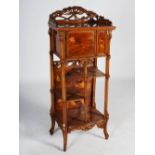 A Continental Art Nouveau style walnut and marquetry inlaid display cabinet in the style of Emile