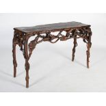 A 19th century organic branch wood console table, the rectangular planked top above an entwined
