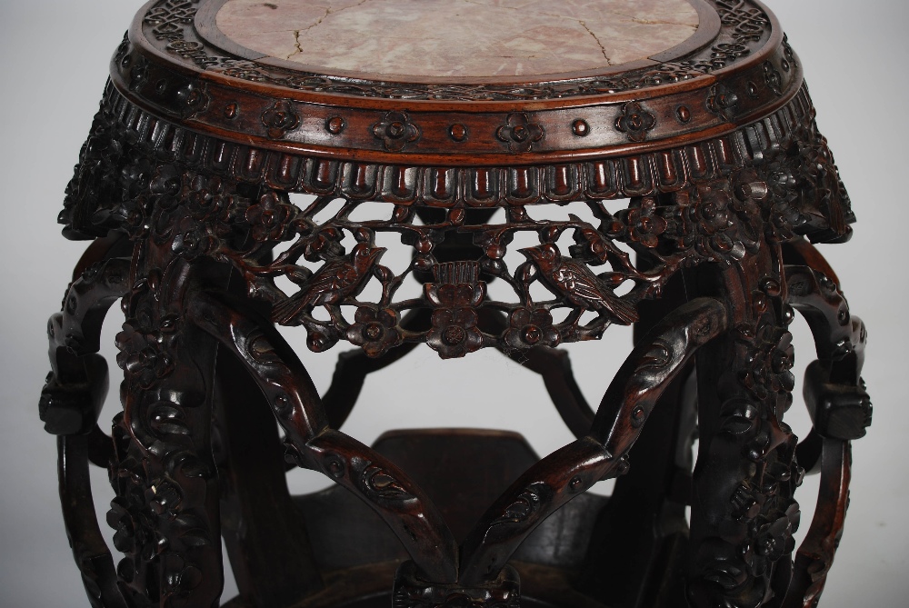 A Chinese dark wood barrel shaped jardiniere stand, Qing Dynasty, the circular top with a mottled - Image 5 of 5