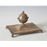 An Edwardian silver inkwell, Sheffield, 1903, makers mark of Walker & Hall, the ball shaped