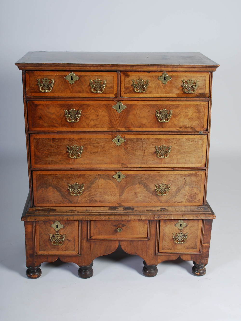 A William & Mary walnut chest on stand, the rectangular top with moulded edge above two short and - Image 8 of 9